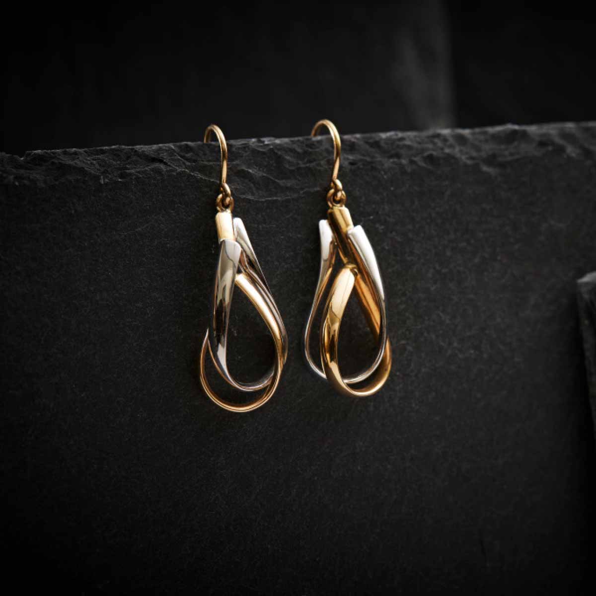 oereringe-i-roedguld-snoede-ovaler