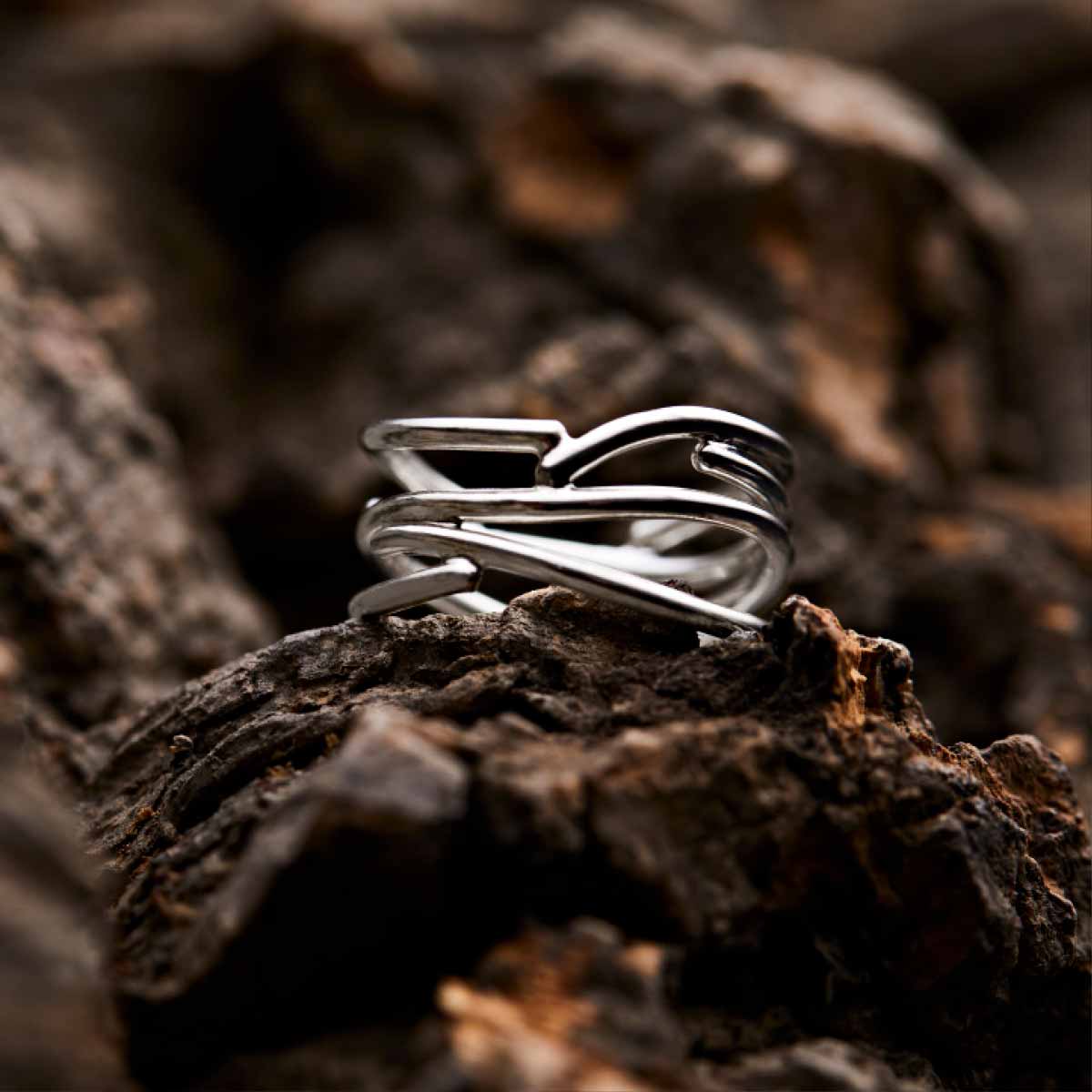 soelvfingerring-med-snoede-ringe